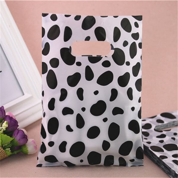 new style wholesale 100pcs/lot 15*20cm milk cow design packaging gift bags with handles plastic shopping bags
new style wholesale 100pcs/lot 15*20cm milk cow design packaging gift bags with handles plastic shopping bags