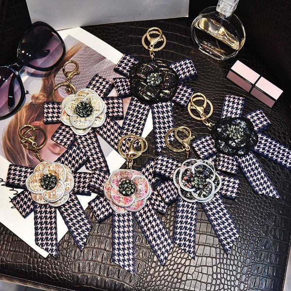 key chain bow tie camellia rose flower pearl pendant car key ring decoration fashion exquisite 2020 keychian, Silver
key chain bow tie camellia rose flower pearl pendant car key ring decoration fashion exquisite 2020 keychian, Silver