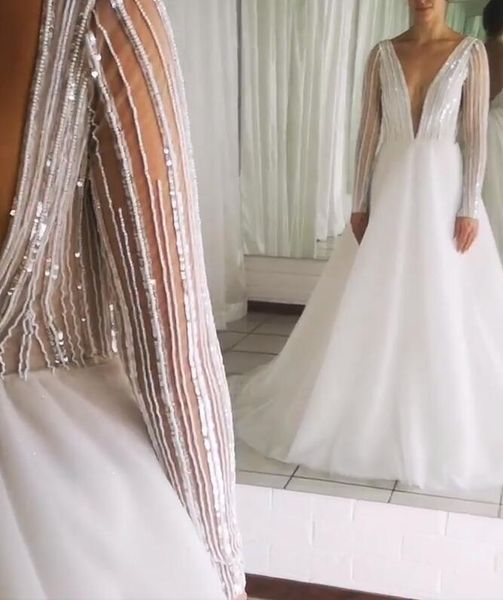 arabic 2019 beaded sequins wedding dresses deep v-neck long sleeves bridal dresses backless wedding gowns zj164, White
arabic 2019 beaded sequins wedding dresses deep v-neck long sleeves bridal dresses backless wedding gowns zj164, White