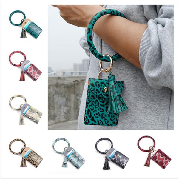 circle bangle wristlets wallet coin purses tassels keychain card holder bag women leopard pu leather bracelets key chain zero wallets e22909, White
circle bangle wristlets wallet coin purses tassels keychain card holder bag women leopard pu leather bracelets key chain zero wallets e22909, White