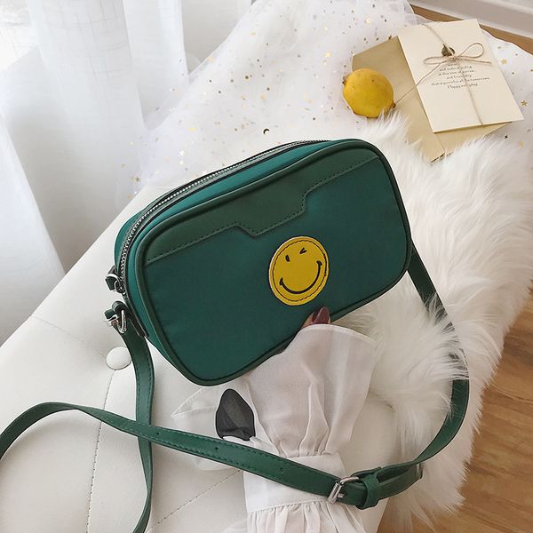 oxford cloth on the new smiling face leisure oblique cloth baonu 2019 new korean version baitie net red shoulder small square
oxford cloth on the new smiling face leisure oblique cloth baonu 2019 new korean version baitie net red shoulder small square