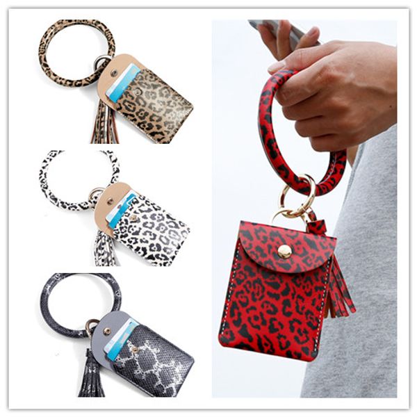 2020 leopard tassel bracelet pu leather card holder bag pendant bangle women handbags purse key ring keychains wallets boutique e22909, White
2020 leopard tassel bracelet pu leather card holder bag pendant bangle women handbags purse key ring keychains wallets boutique e22909, White