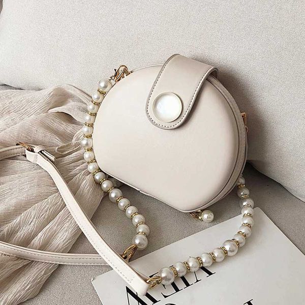 elegant female round bag 2020 summer new quality pu leather women's handbag pearl chain shoulder messenger bag purses
elegant female round bag 2020 summer new quality pu leather women's handbag pearl chain shoulder messenger bag purses