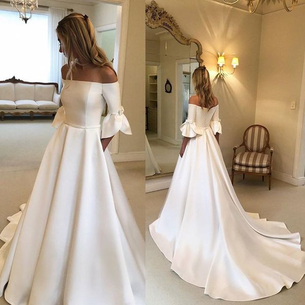 2022 elegant bohemia wedding gowns a line satin bateau covered button bridal gowns chapel train abiti da sposa, White
2022 elegant bohemia wedding gowns a line satin bateau covered button bridal gowns chapel train abiti da sposa, White