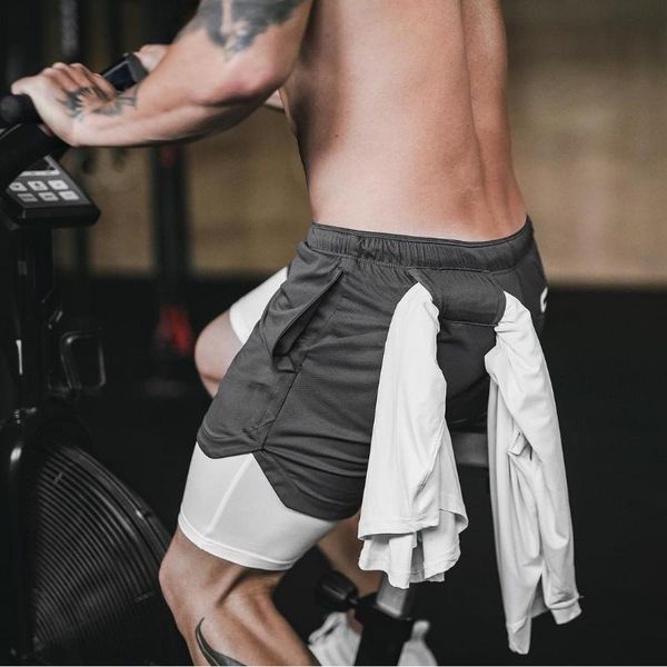 men's brand shorts running shorts quick drying sport 2 in 1 fitness workout built-in pockets under layer short pants men, Black;blue
men's brand shorts running shorts quick drying sport 2 in 1 fitness workout built-in pockets under layer short pants men, Black;blue