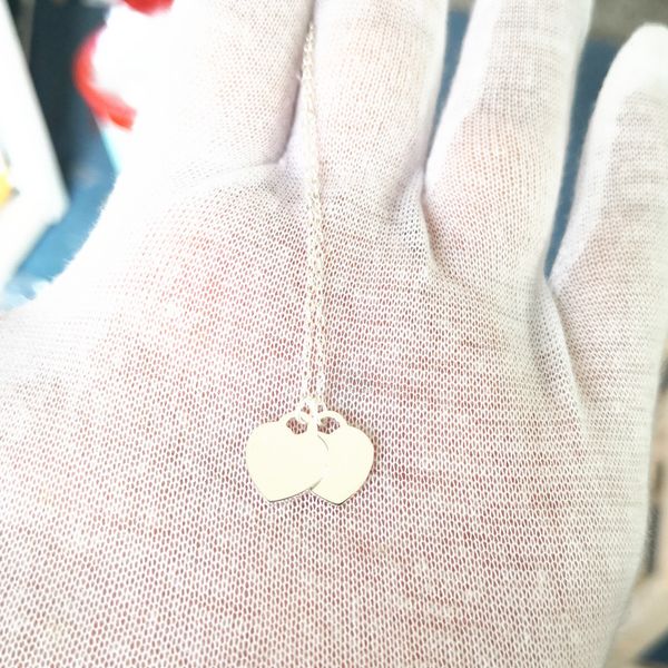 european and american classic lady silver sweet romantic double heart-shaped strip tags anniversary couple necklace pendant jewelry
european and american classic lady silver sweet romantic double heart-shaped strip tags anniversary couple necklace pendant jewelry