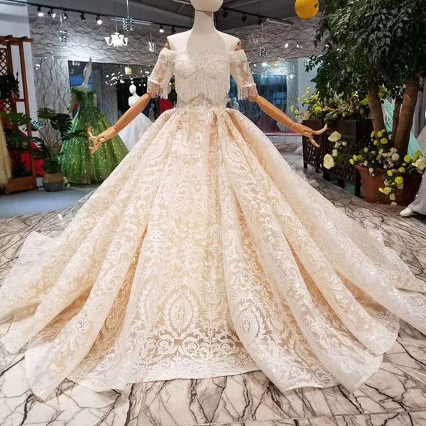 lace appplique wedding dresses champagne off the shoulder boat neck shiny wedding gown tassel with train illusion sleeve 2019 design, White
lace appplique wedding dresses champagne off the shoulder boat neck shiny wedding gown tassel with train illusion sleeve 2019 design, White