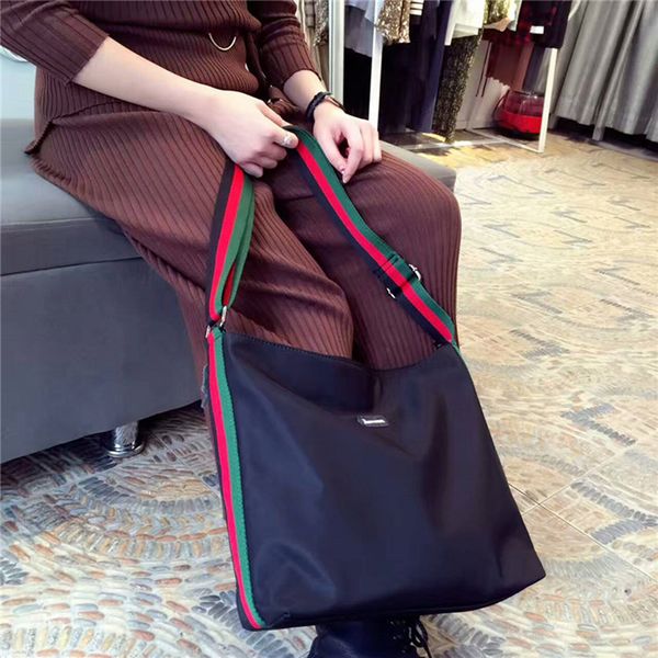 nylon lady handbag contrast bag stripe retro large capacity shoulder messenger bag brand women's shoulder bag 20
nylon lady handbag contrast bag stripe retro large capacity shoulder messenger bag brand women's shoulder bag 20
