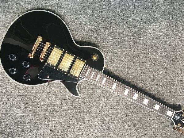 Black lp cu tom electric guitar with black pick guard guitar golden tuning key with 3 pickup guitar
Black lp cu tom electric guitar with black pick guard guitar golden tuning key with 3 pickup guitar