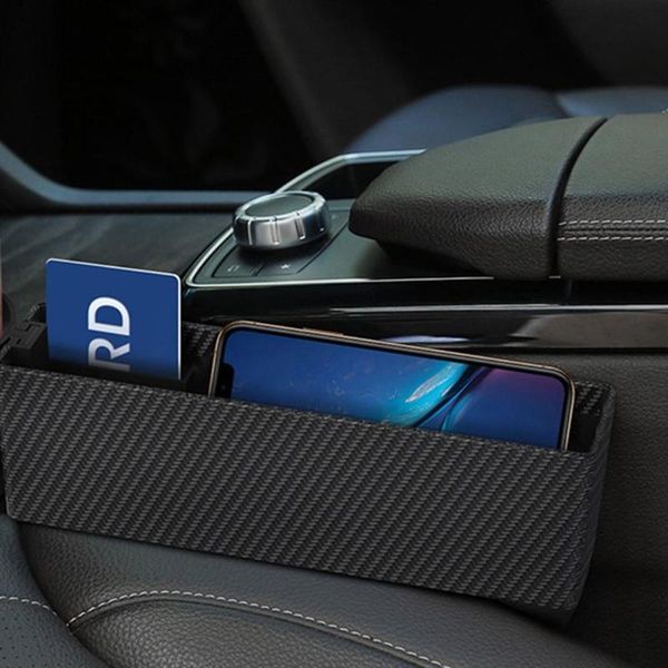 car seat gap storage box simulation leather carbon fiber multi-function mobile phone car storage box supplies 1pcs
car seat gap storage box simulation leather carbon fiber multi-function mobile phone car storage box supplies 1pcs