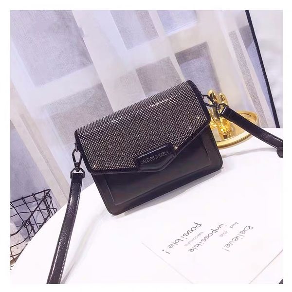 the new small bag female fashion personality inlaid diamond limited fragrance single shoulder slant slant small bag
the new small bag female fashion personality inlaid diamond limited fragrance single shoulder slant slant small bag