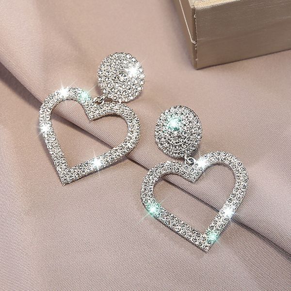 bohemian earrings fashion simple personality triangle hollow love crystal earrings new long net red women's kloczyki, Golden;silver
bohemian earrings fashion simple personality triangle hollow love crystal earrings new long net red women's kloczyki, Golden;silver