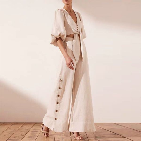 casual solid women two piece set v neck lantern sleeve button criss hem with button high waist wide leg pants set e240, White
casual solid women two piece set v neck lantern sleeve button criss hem with button high waist wide leg pants set e240, White