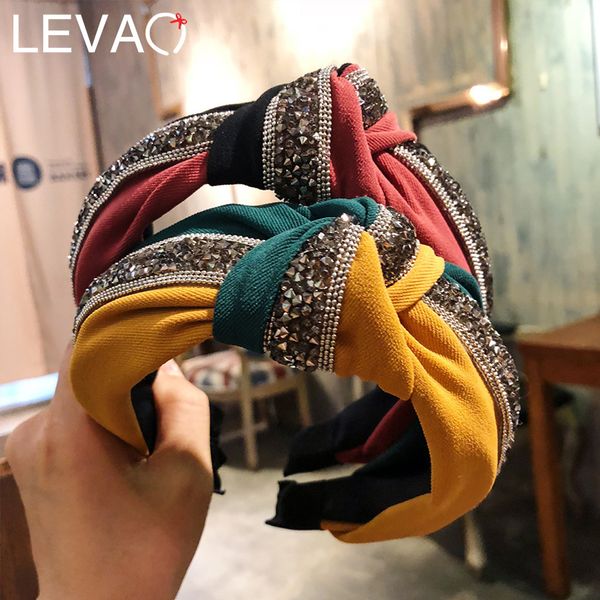 levao элегантный rhinstone твист повязки ленты для волос для женщин головные уборы новая ткань лоскутное узловатые волосы обруч головной убо
levao элегантный rhinstone твист повязки ленты для волос для женщин головные уборы новая ткань лоскутное узловатые волосы обруч головной убо