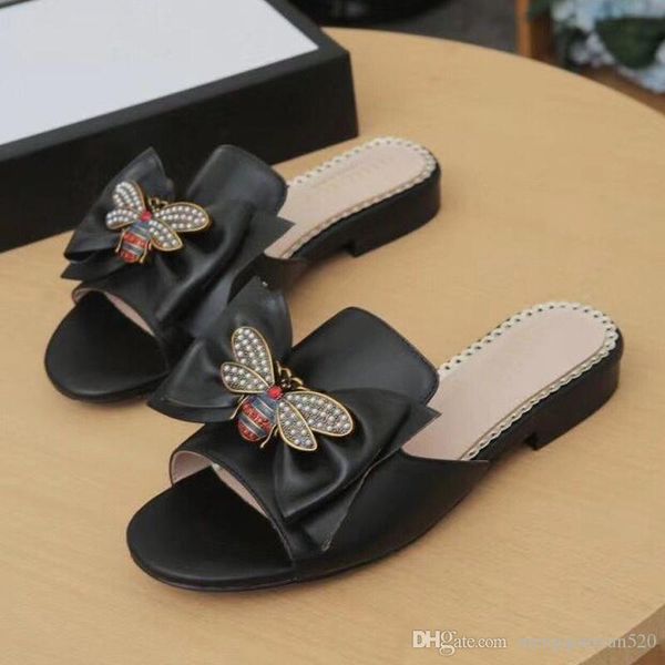 fashion luxury slippers summer woman cartoon big head beach slippers designer leather flat sandals l metal bee slippers large size 35-42, Black 
fashion luxury slippers summer woman cartoon big head beach slippers designer leather flat sandals l metal bee slippers large size 35-42, Black