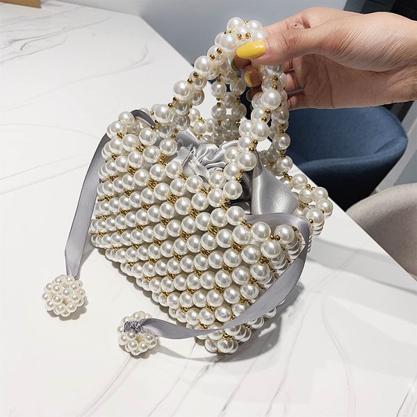 diy handmade pearl knitting bag 2020 women bag designers fashion beaded woven shoulder bags ladies handbag tote
diy handmade pearl knitting bag 2020 women bag designers fashion beaded woven shoulder bags ladies handbag tote