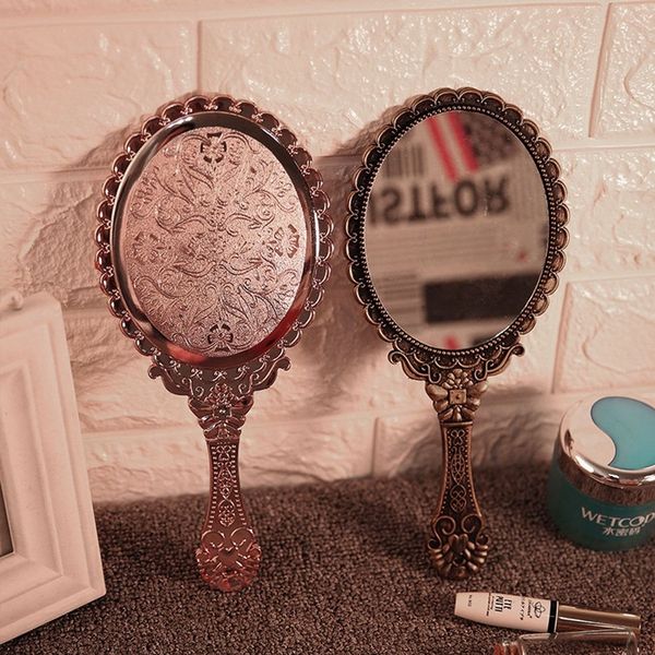 vintage handhold makeup mirror pink repousse floral oval round cosmetic hand held mirror with handle for ladies beauty dresser
vintage handhold makeup mirror pink repousse floral oval round cosmetic hand held mirror with handle for ladies beauty dresser