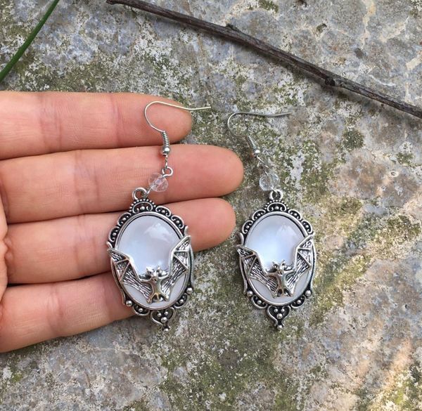 gothic dangle bat cameo earrings,vampire bat earrings,bat lovers,witches,gothic victorian silver framed cameo earrings 
gothic dangle bat cameo earrings,vampire bat earrings,bat lovers,witches,gothic victorian silver framed cameo earrings