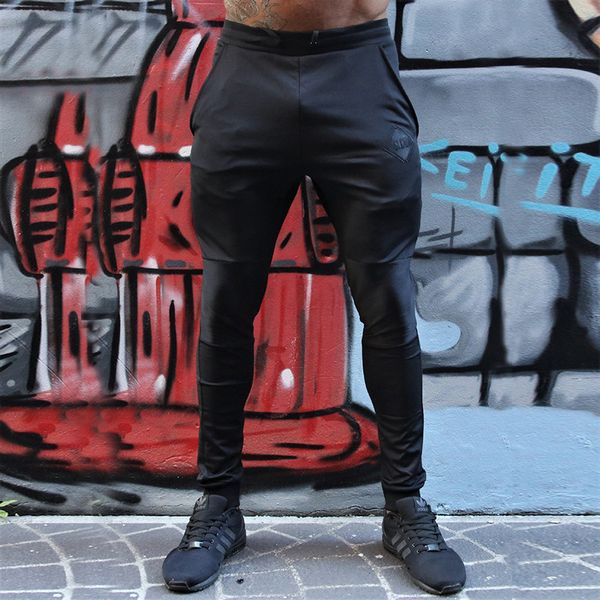 2019 muscle fitness trousers men casual breathable running training gym jogging pants men, Black;blue
2019 muscle fitness trousers men casual breathable running training gym jogging pants men, Black;blue