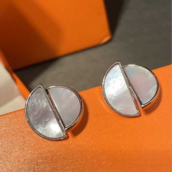 very simple round rotating earrings shell temperament chic simple cold wind earrings, Golden;silver
very simple round rotating earrings shell temperament chic simple cold wind earrings, Golden;silver