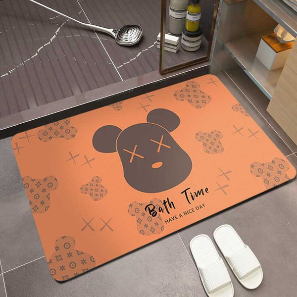 Super absorbent bathroom floor mat for the toilet room made of silaite. Features cartoon design, anti-slip property, dirt resistance and dark color.T260702