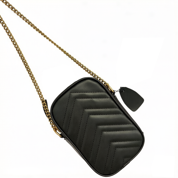 Vintage minimalist phone bag with a zipper closure and internal card compartments; metal chain shoulder strap, highly portable capacity.