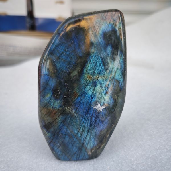 Natural blue light elongated stone raw stone ornament, strong color moonlight stone handle decoration, mineral specimen consultation customer service