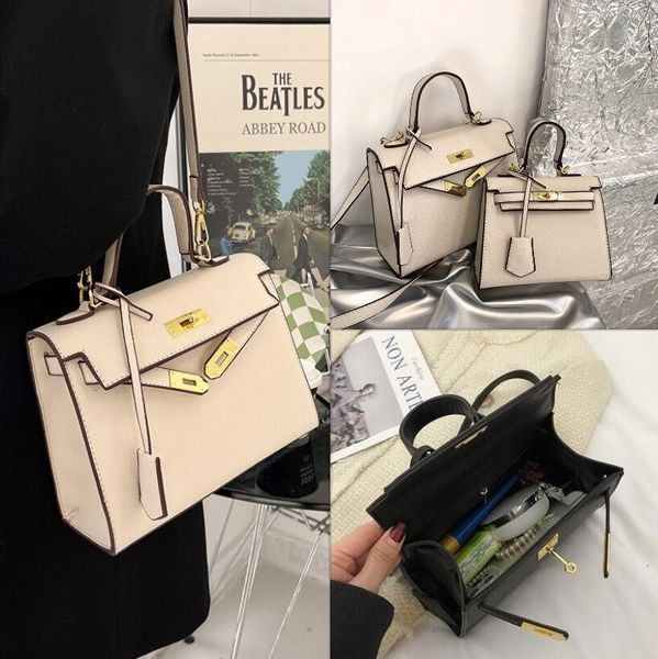 Fashion womens handbags popular solid color thick leather handbags simple and versatile lychee pattern shoulder bag classic atmospheric buckle crossbody bag, Black
Fashion womens handbags popular solid color thick leather handbags simple and versatile lychee pattern shoulder bag classic atmospheric buckle crossbody bag, Black