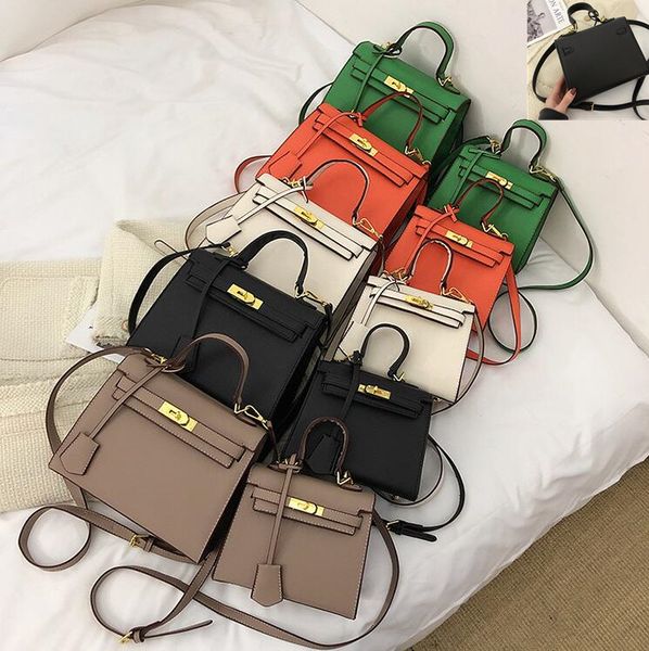 Western womens handbags popular solid color thick leather handbags simple and versatile lychee pattern shoulder bag classic atmospheric buckle crossbody bag, Black
Western womens handbags popular solid color thick leather handbags simple and versatile lychee pattern shoulder bag classic atmospheric buckle crossbody bag, Black
