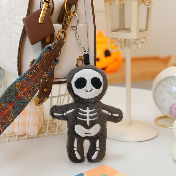 Halloween black and white skeleton pendant plush toy keychain creative design adds festive atmosphere
Halloween black and white skeleton pendant plush toy keychain creative design adds festive atmosphere