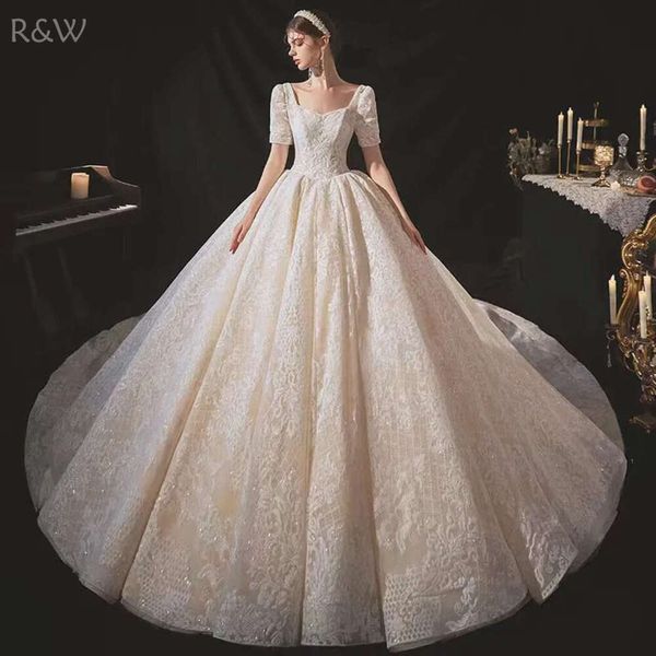 R&W 2023 Lace a e Wedding Dresses Embroider elegant neck Long Sleeves Beaded Overskirt Dubai Arabic sweep train vintage Bridal Gowns