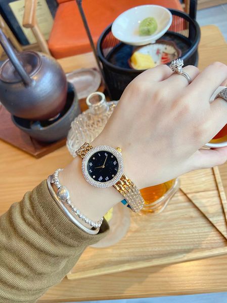 AAA Designer Women's Watch Quartz Movement alloy casel Case with Diamond Small Red Book amn, Clear
AAA Designer Women's Watch Quartz Movement alloy casel Case with Diamond Small Red Book amn, Clear