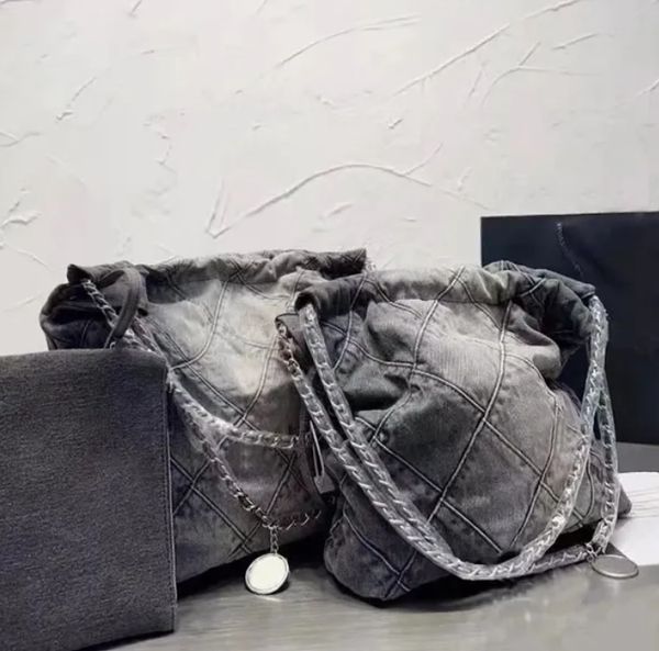 Denim Shoulder Classic denim shopping tote with wallet inside sier chain hardware New casual handbag commuter bag, Black
Denim Shoulder Classic denim shopping tote with wallet inside sier chain hardware New casual handbag commuter bag, Black