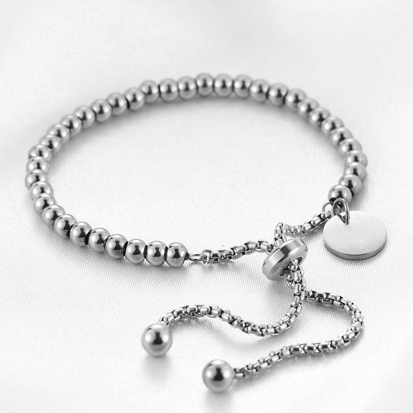 Fashionable titanium steel simple circular hang tag adjustable round bead engraved bracelet jewelry
Fashionable titanium steel simple circular hang tag adjustable round bead engraved bracelet jewelry