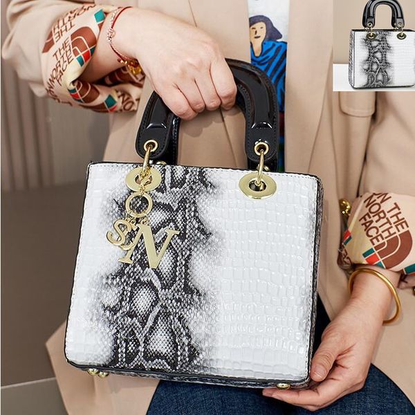 Fashionable womens handbags elegant atmosphere snake shoulder bag popular embossed leather handbags daily Joker stone mother bag metal pendant women's bag, Multi
Fashionable womens handbags elegant atmosphere snake shoulder bag popular embossed leather handbags daily Joker stone mother bag metal pendant women's bag, Multi