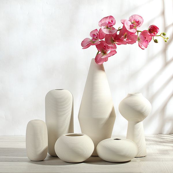 Ceramic white vase Wholesale modern Abstract simplicity living room home soft decoration flower arrangement ornaments
Ceramic white vase Wholesale modern Abstract simplicity living room home soft decoration flower arrangement ornaments