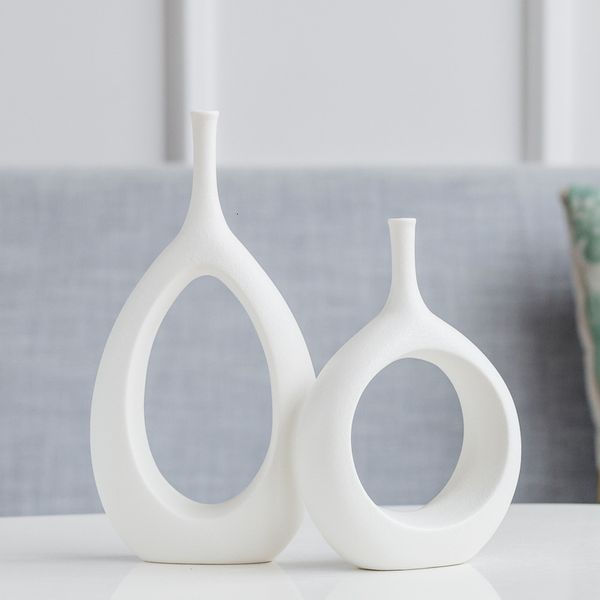 Hollow Ceramic Vase Ornaments Home Crafts Matte Simple Donut Flower Arrangement Living Room Decoration
Hollow Ceramic Vase Ornaments Home Crafts Matte Simple Donut Flower Arrangement Living Room Decoration