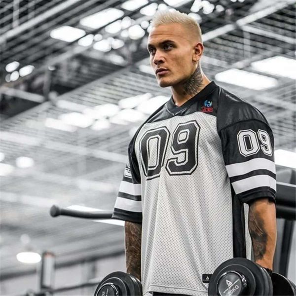Fitness T-shirt for men summer new tee oversized edition American style training basketball suit short sleeved loose fit quick drying sports quarter sleeved crop top, Red
Fitness T-shirt for men summer new tee oversized edition American style training basketball suit short sleeved loose fit quick drying sports quarter sleeved crop top, Red