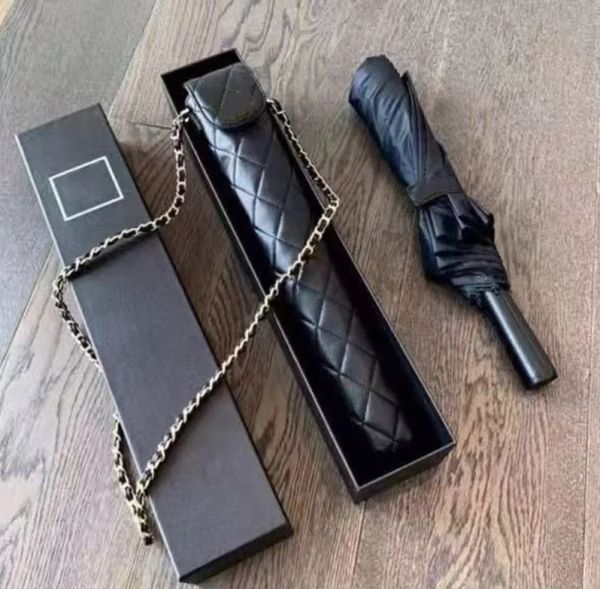 2026 Reviemdesigner Letter Logo Sun Protection Black Rubber cologne Long perfume Handle Umbrella Classic Fashion Raingear Free Shipping
