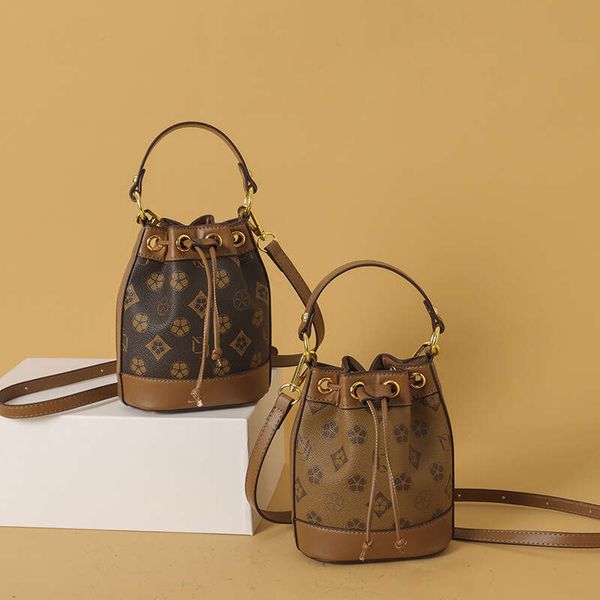 2024 new women's fashionable and stylish letter printed drawstring bucket bag, high-end single shoulder crossbody bag, Multi-color
2024 new women's fashionable and stylish letter printed drawstring bucket bag, high-end single shoulder crossbody bag, Multi-color