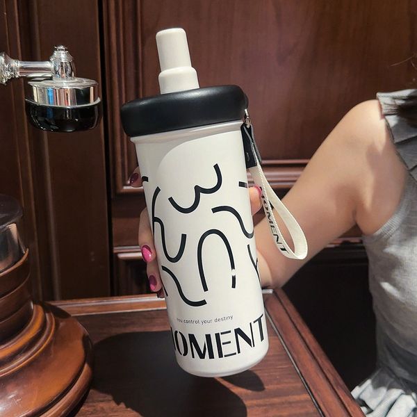 20.3oz stainless steel travel tumbler leakproof sports water bottle with handle strap reusable cup