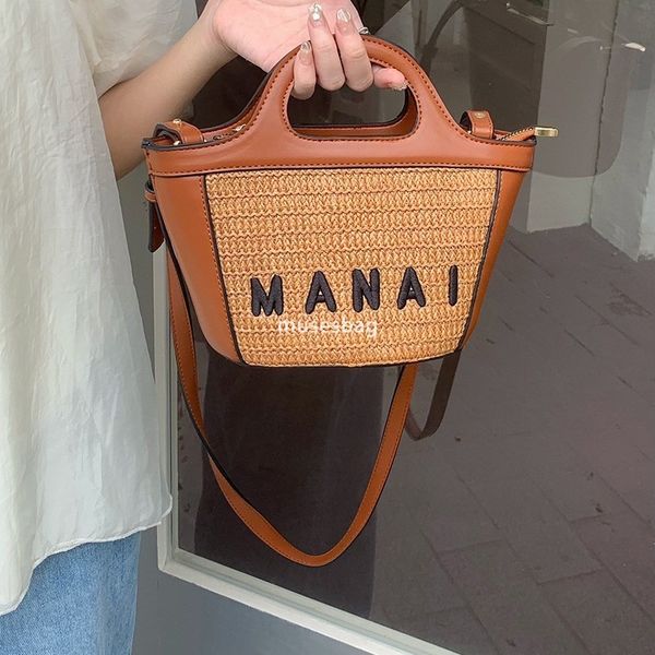 High end women's fashion niche hand-held vegetable basket bag summer beach rattan woven beach bag woven crossbody bag versatile grass woven handbag, Brown
High end women's fashion niche hand-held vegetable basket bag summer beach rattan woven beach bag woven crossbody bag versatile grass woven handbag, Brown