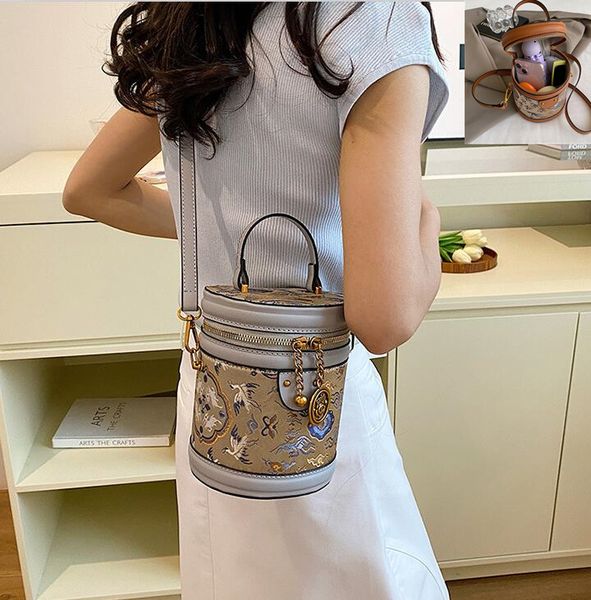 Factory wholesale women handbag summer exquisite embroidery bag daily with cylindrical totem printed handbag sweet trend leather bucket bag 4462#, Black 
Factory wholesale women handbag summer exquisite embroidery bag daily with cylindrical totem printed handbag sweet trend leather bucket bag 4462#, Black