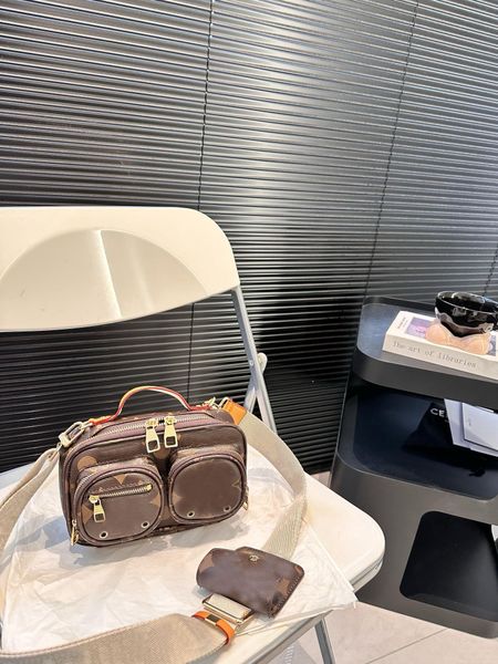 2024 New utility crossbody genuine leather designer Digital camera for women and mens clutch handbag brand shoulder bags tote bag M80446, M12925-1
2024 New utility crossbody genuine leather designer Digital camera for women and mens clutch handbag brand shoulder bags tote bag M80446, M12925-1