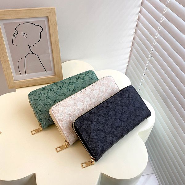 Outlet factory women handbag 3 colors niche design fashion long wallet large color matching leather women wallets classic polka dot clutch bag 8566#, Image colors
Outlet factory women handbag 3 colors niche design fashion long wallet large color matching leather women wallets classic polka dot clutch bag 8566#, Image colors