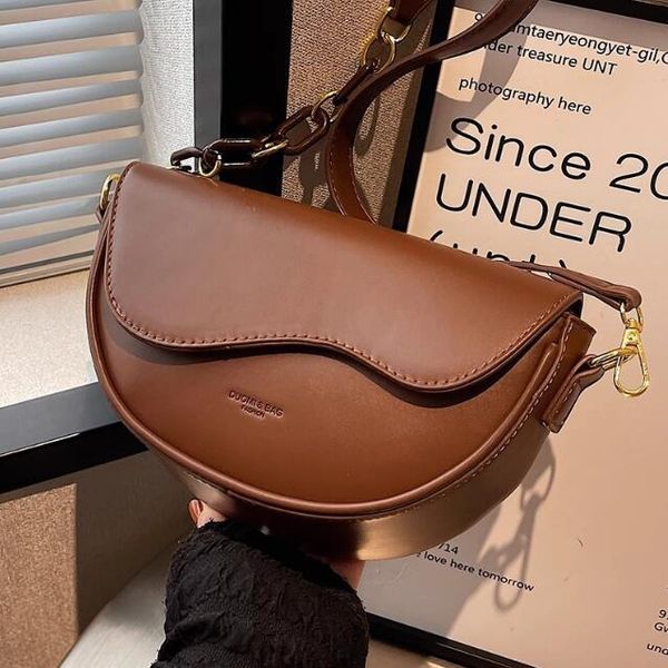 Women Saddle Shoulder bag High quality PU Leather Underarm bag designer Flap bag Solid Color Fashion handbag crossbody Satchel bag Totes wallet, Black
Women Saddle Shoulder bag High quality PU Leather Underarm bag designer Flap bag Solid Color Fashion handbag crossbody Satchel bag Totes wallet, Black