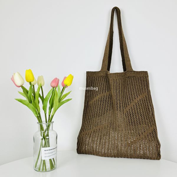 New minimalist and stylish portable bag knitted bag hollowed out bag single shoulder bag large capacity tote bag beach bag women bag trend, Khaki
New minimalist and stylish portable bag knitted bag hollowed out bag single shoulder bag large capacity tote bag beach bag women bag trend, Khaki
