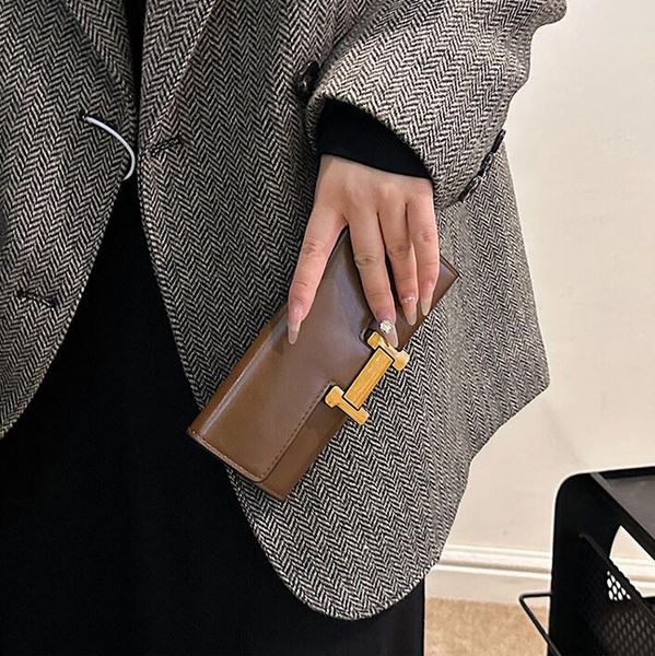 Factory wholesale womens shoulder bag multi card folding long wallet elegant atmosphere solid color leather coin purse simple Joker women clutch bag 1520#, Black
Factory wholesale womens shoulder bag multi card folding long wallet elegant atmosphere solid color leather coin purse simple Joker women clutch bag 1520#, Black