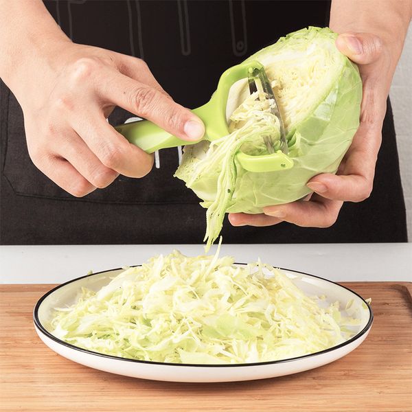 Cabbage shredder household fruit and vegetable scraper wide mouth multifunctional peeler Wholesale
Cabbage shredder household fruit and vegetable scraper wide mouth multifunctional peeler Wholesale