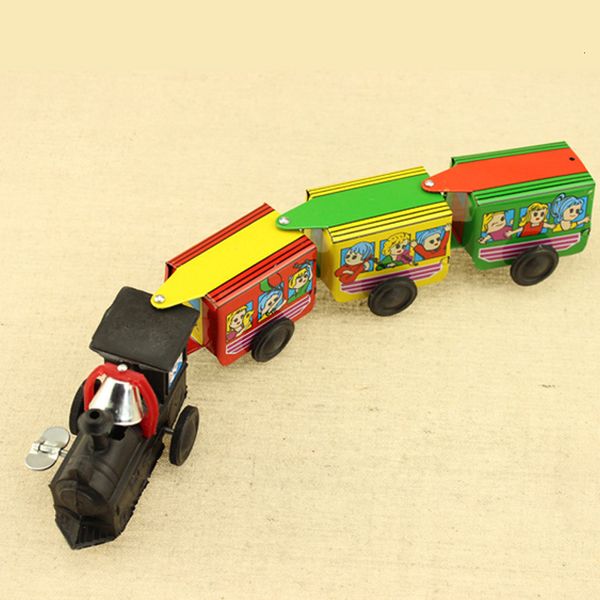 Nostalgic Retro Tin Toy Clockwork Iron Train With Three Carriages That Winds Up And Moves Automatically
Nostalgic Retro Tin Toy Clockwork Iron Train With Three Carriages That Winds Up And Moves Automatically